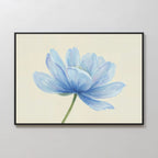 The Daybreak Flower Canvas Art is a framed minimalist print featuring a single light blue flower with delicate petals on a beige background—ideal for modern wall art or bedroom decor.