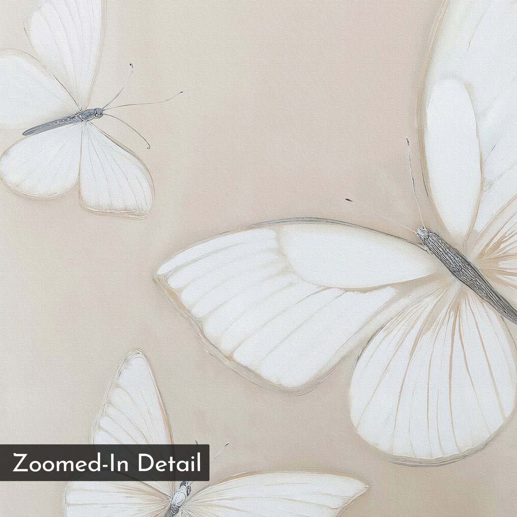 A close-up view of three white butterflies with delicate wings on a soft beige backdrop, perfect as butterfly wall art. Features a Zoomed-In Detail label. Product: Delicate Whites Canvas Art.