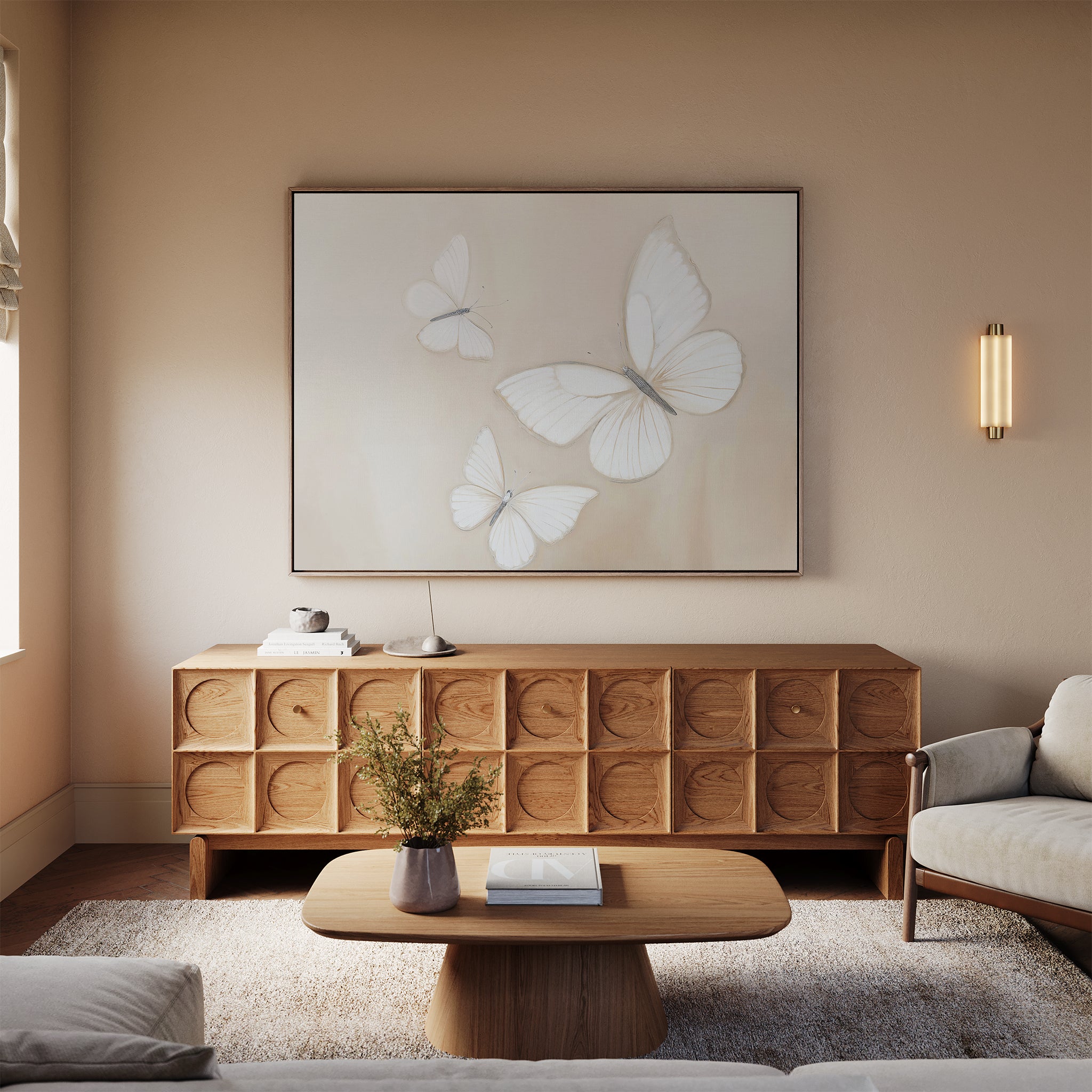 A cozy living room with neutral tones features a Nordic Park wooden coffee table, textured sideboard, white rug, beige sofa, and the Delicate Whites Canvas Art as striking neutral wall decor above the sideboard.