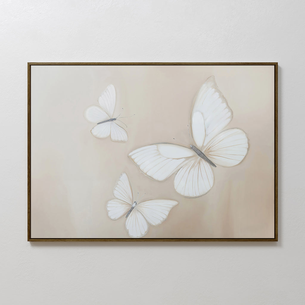 Delicate Whites Canvas Art features three subtle white butterflies with gray outlines on a beige and cream backdrop—ideal butterfly wall art to bring neutral decor to your Nordic Park-inspired space.