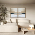 A modern living room featuring the Desert Quietude Set of 2 above a cream sectional, paired with a wooden coffee table and lush potted plant—perfect inspiration for stylish, contemporary living room decor.