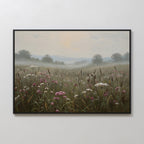 Add a tranquil touch to your space with the Distant Fields Canvas Art, a framed painting of a misty meadow with wildflowers and tall grasses in soft, muted colors beneath a pale sky and distant trees.