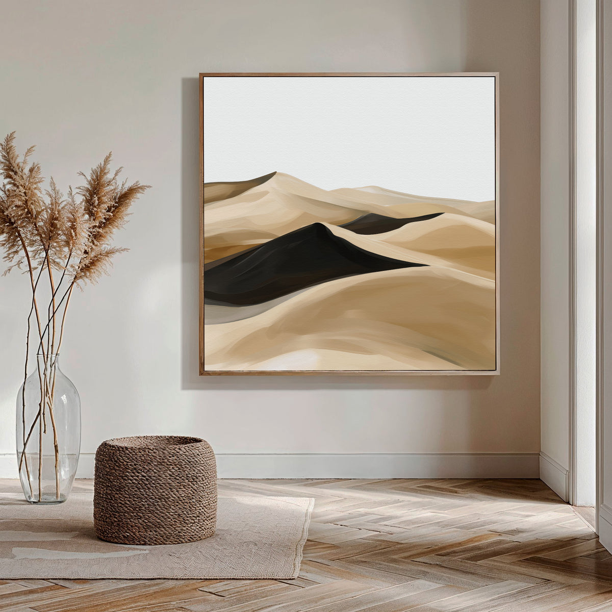 A minimalist room features the Dune Waves Abstract Canvas Art above, a woven basket on the wooden floor, and tall pampas grass in a glass vase by the corner. Natural light streams in, highlighting the modern living room decor.