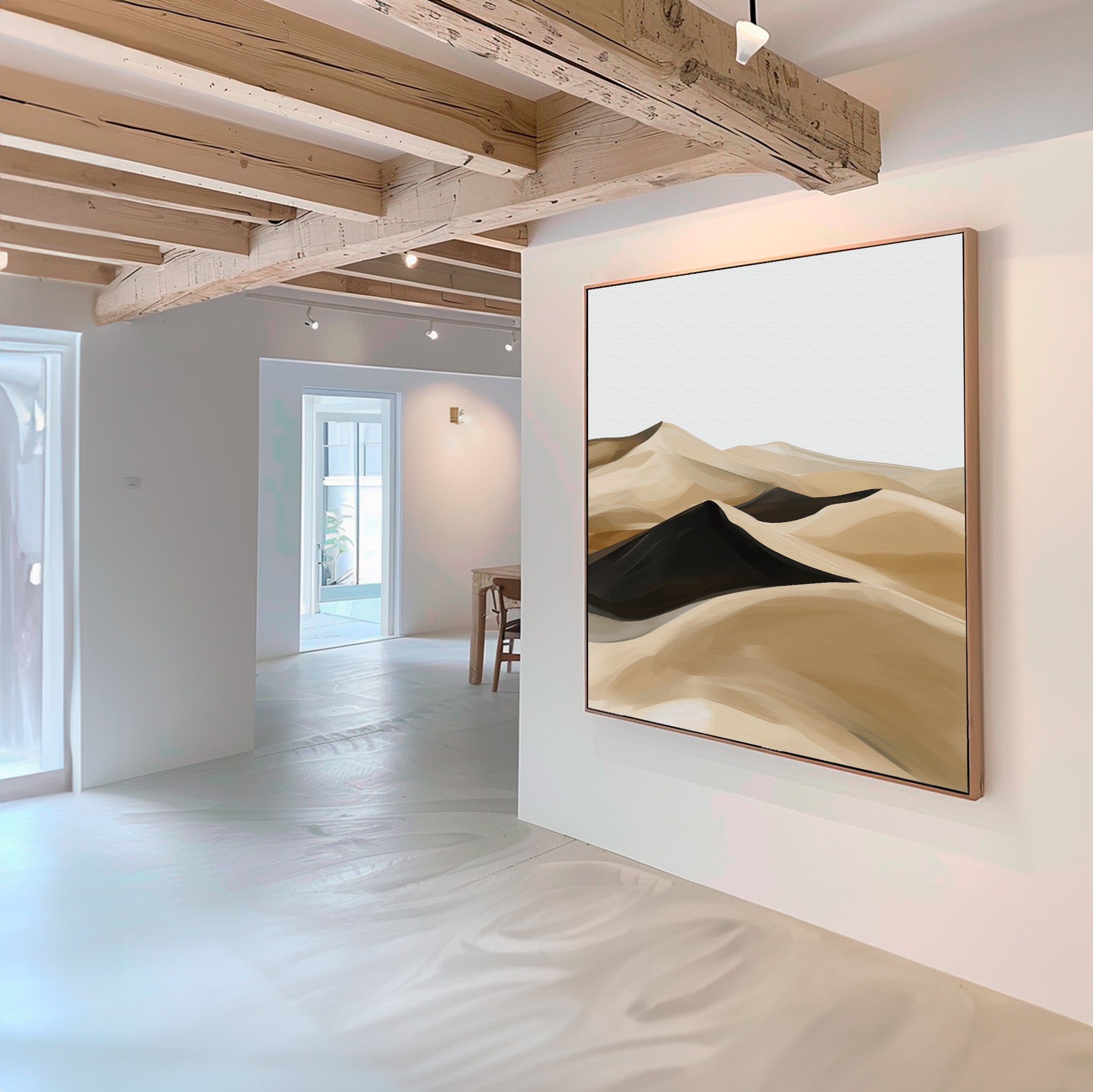 A modern, minimalist interior with white walls and wooden beams features the Dune Waves Abstract Canvas Art—an abstract painting of sand dunes in beige, brown, and black—perfect for contemporary living room decor.