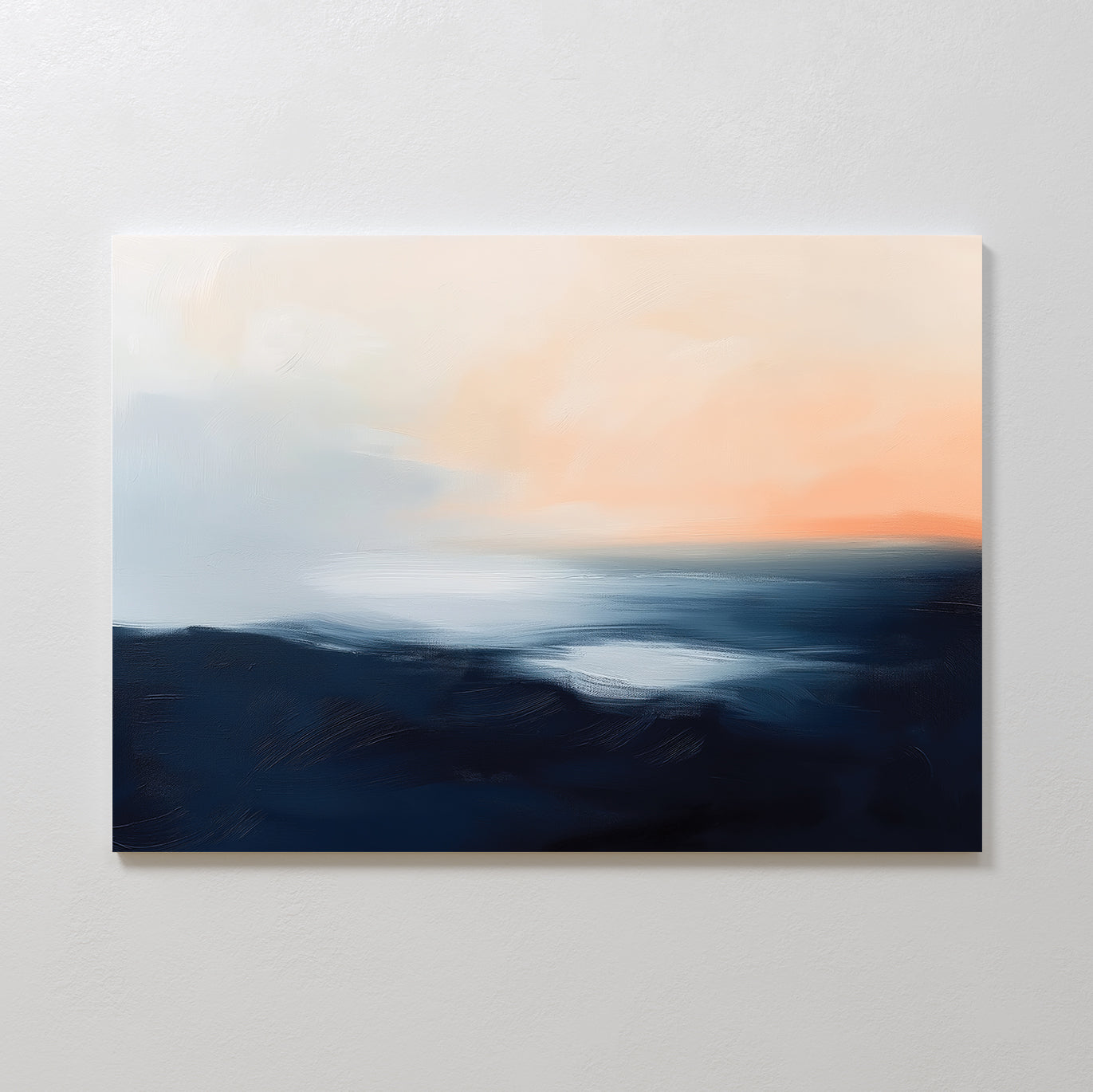 Dusk Ridge Canvas Art features dark blue and black brushstrokes at the base, blending into lighter blue, white, and soft peach tones above—a tranquil wall art piece that evokes a serene sunset seascape for your bedroom decor.