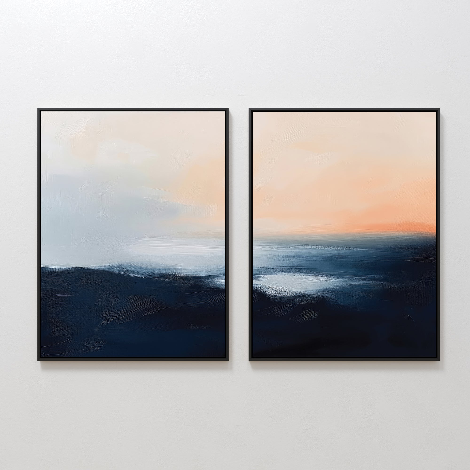 The Dusk Ridge Set of 2 features framed abstract landscape wall art in dark blue, white, and warm orange hues, evoking a serene sunrise or sunset—perfect for adding a calming touch to bedroom decor on a white wall.