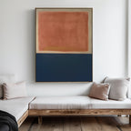 A minimalist room with light wood bench seating, beige cushions, and the Dusk Stripe Abstract Canvas Art featuring a soft rectangular block of reddish-brown above a deep blue block displayed on the wall.
