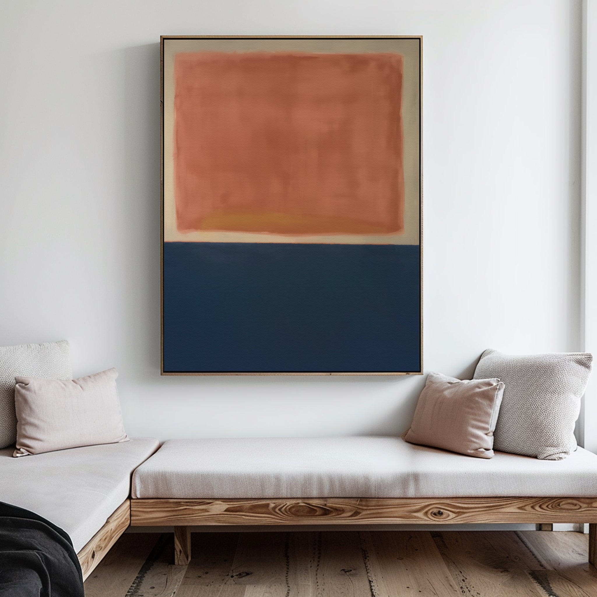 A minimalist room with light wood bench seating, beige cushions, and the Dusk Stripe Abstract Canvas Art featuring a soft rectangular block of reddish-brown above a deep blue block displayed on the wall.