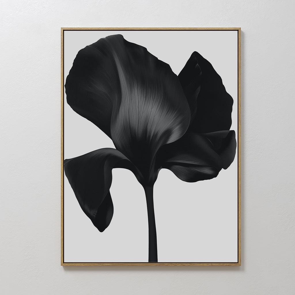 Eclipse Bloom Canvas Art features a close-up of a dark abstract flower with bold petals on a light background—an ideal minimalist piece to elevate your living room decor.