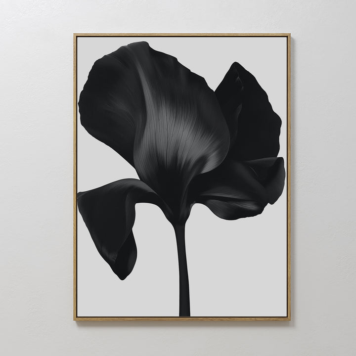 Eclipse Bloom Canvas Art features a close-up of a dark abstract flower with bold petals on a light background—an ideal minimalist piece to elevate your living room decor.