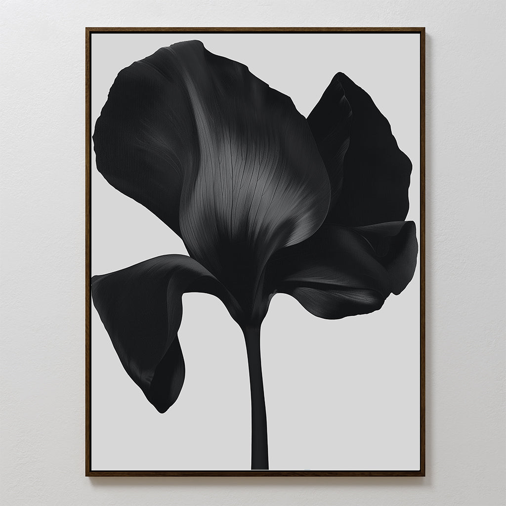 Eclipse Bloom Canvas Art: a framed minimalist wall art featuring a bold black flower on a light gray backdrop—ideal modern decor for your living room.
