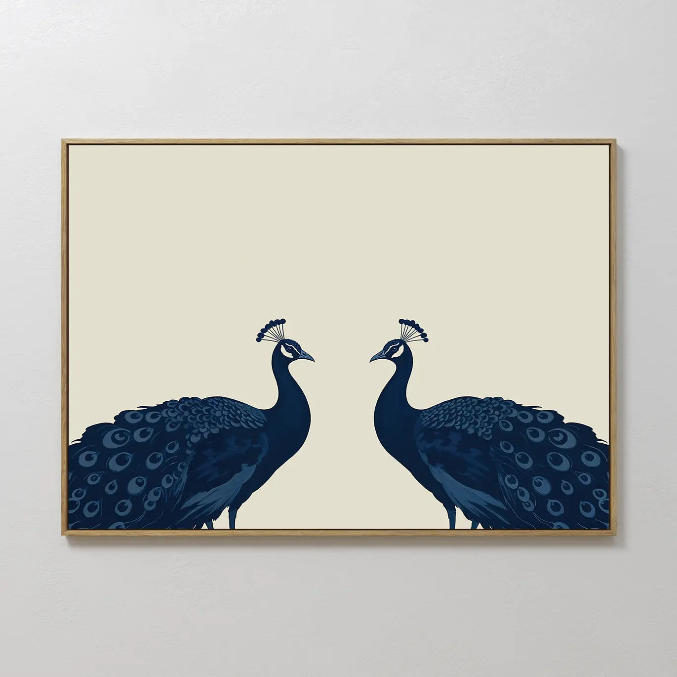 Elegant Plumage Canvas Art showcases two dark blue peacocks facing each other on a light beige background, with detailed feathers and crests—perfect for adding a striking, minimalist touch to your living room decor.
