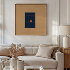 A beige sofa with neutral pillows sits below the Ember Point Canvas Art, paired with a wooden side table, white lamp, and a vase of dried flowers for perfect modern living room decor.