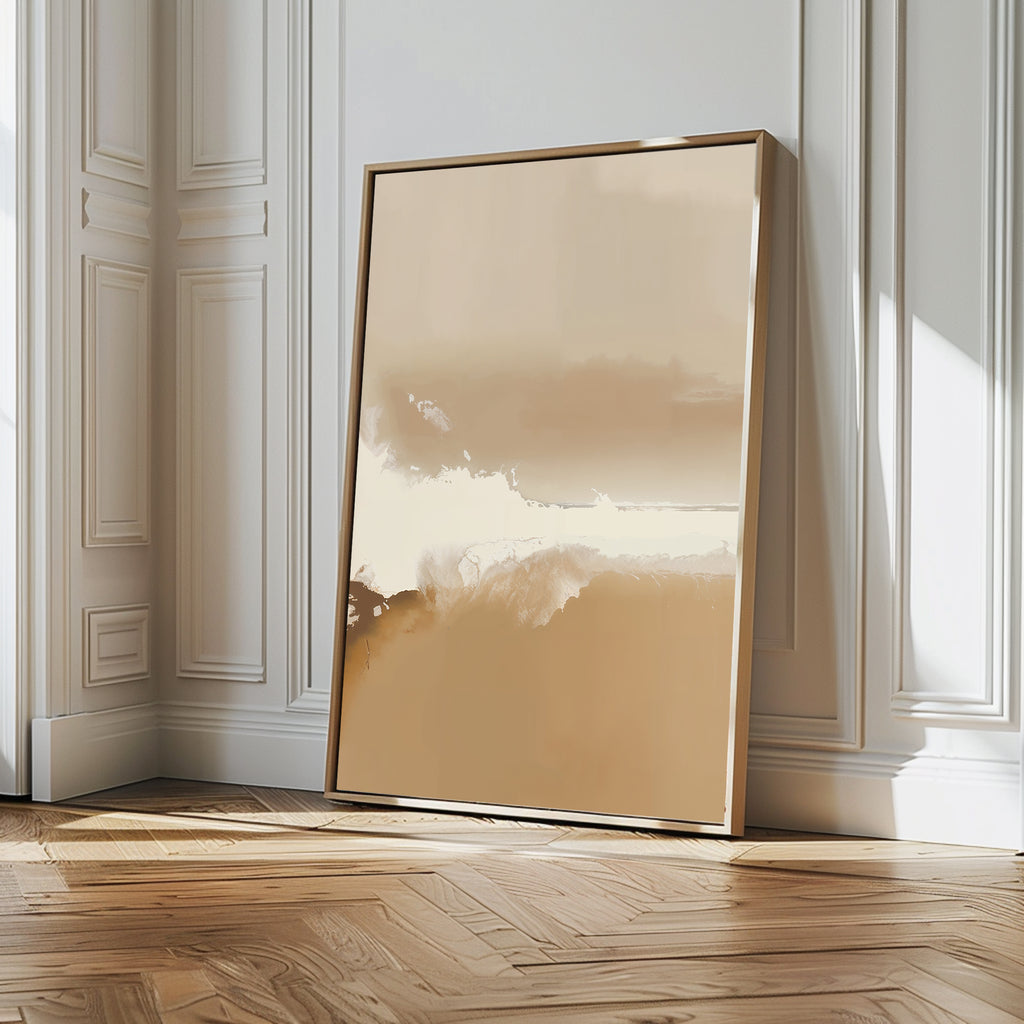 The Ethereal Plains Abstract Canvas Art, featuring beige and white tones and elegantly framed, leans against a white paneled wall on a wooden floor, bringing sophistication to any modern living room decor.