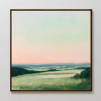 The Evening Hues Abstract Canvas Art features rolling green hills, scattered trees, and a pastel sky in soft pink and blue—an ideal framed wall print to elevate your bedroom or living room decor.
