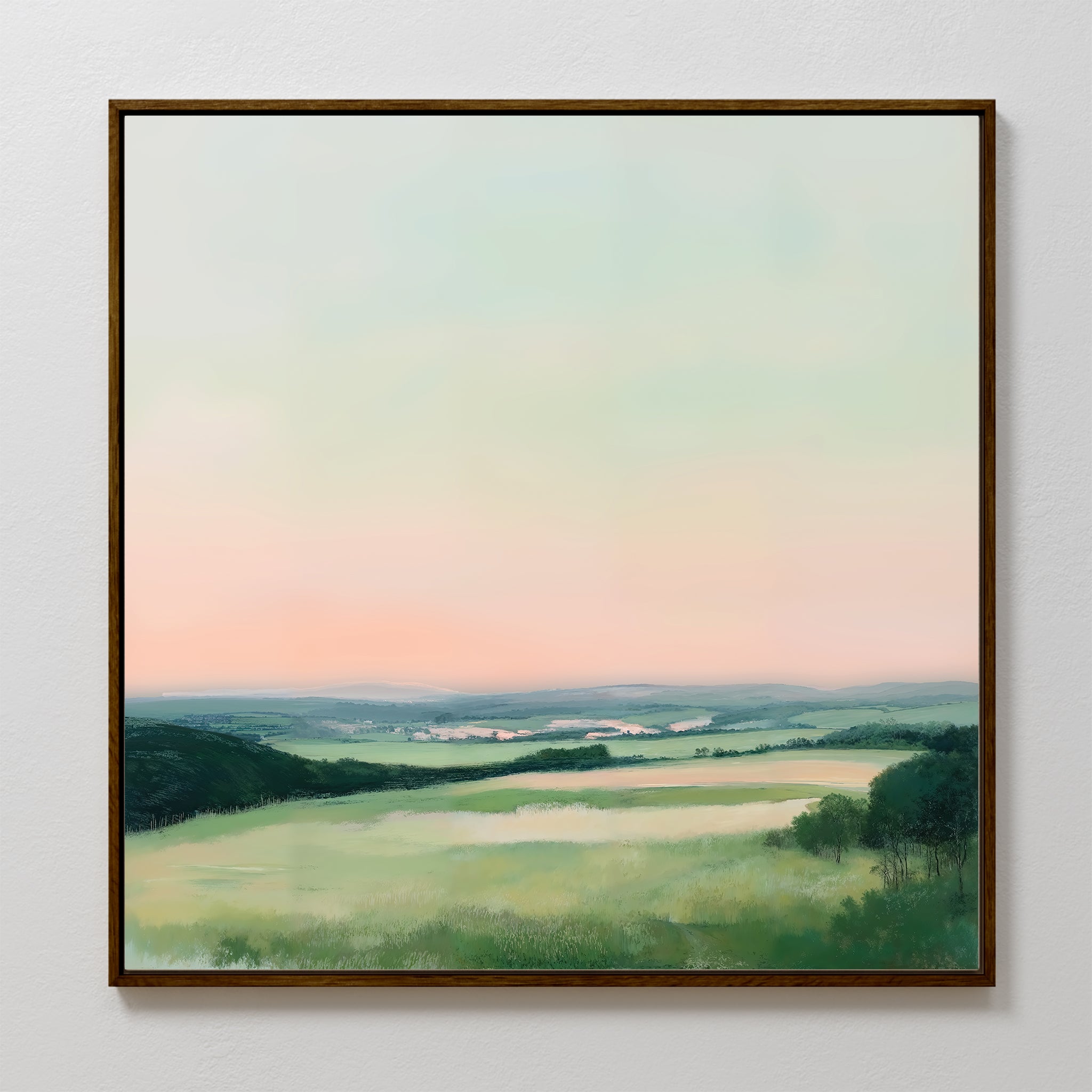 The Evening Hues Abstract Canvas Art features rolling green hills, scattered trees, and a pastel sky in soft pink and blue—an ideal framed wall print to elevate your bedroom or living room decor.