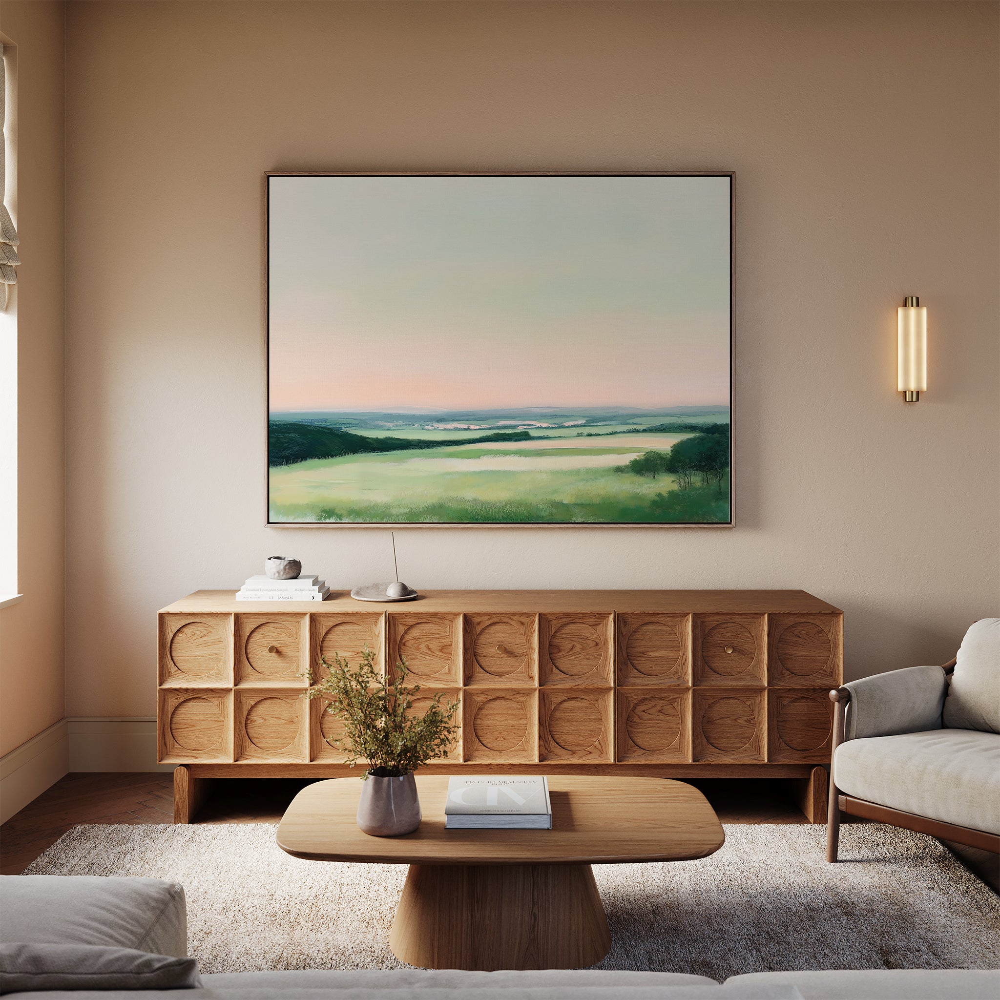 A modern living room with a light wood sideboard, Evening Hues Canvas Art – Horizontal above it, a low wooden coffee table, beige sofa, and soft neutral decor all bathed in natural light.