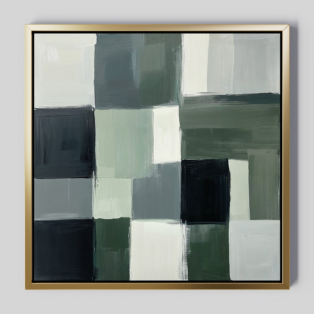 Evergreen Abstract Canvas Art showcases overlapping green, black, gray, and white rectangles in a grid pattern. This modern wall art features a thin gold frame and a light background for a sleek look.