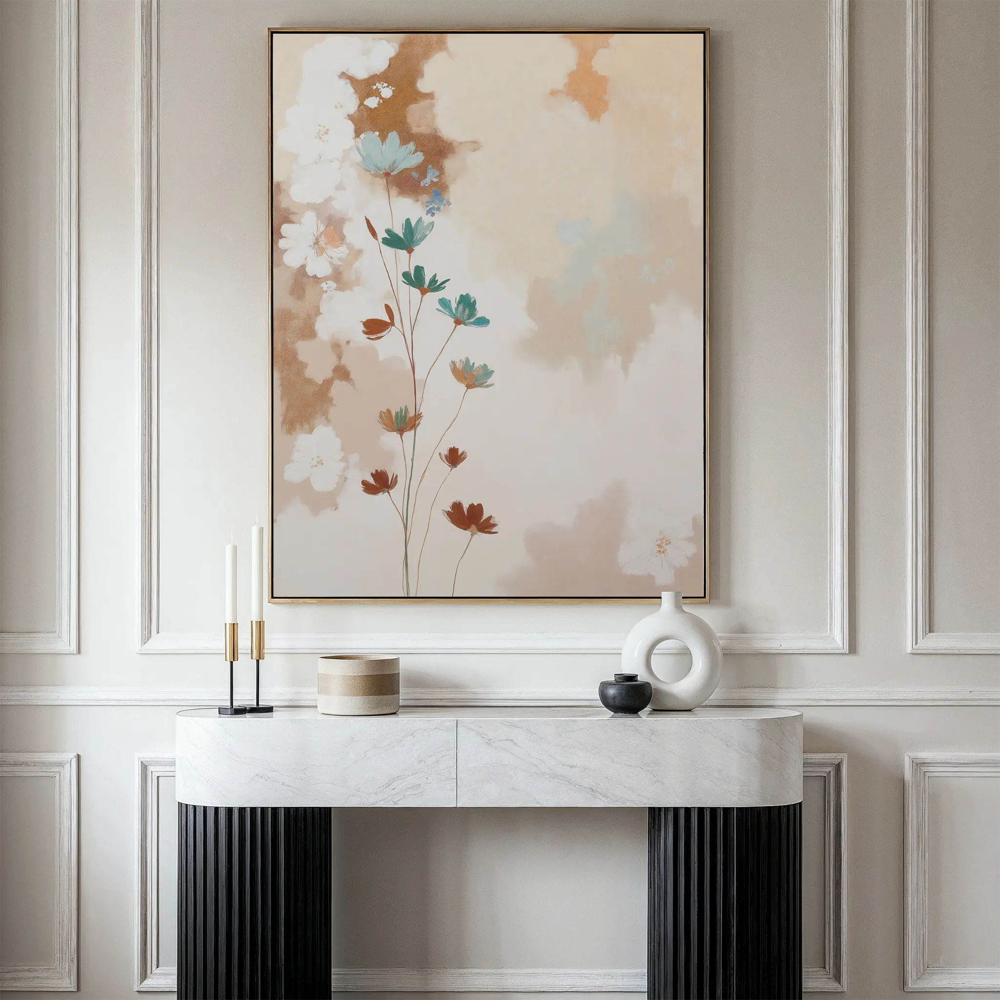 A modern console table with marble top displays vintage-inspired decor beneath the Faded Flora Canvas Art in soft beige tones, all set against an elegant white paneled wall.