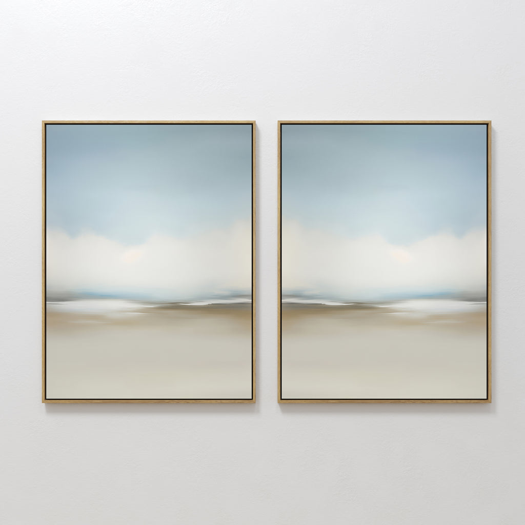 The Faded Silence Set of 2 features large, minimalist wall art with soft, blurred tones of blue, beige, and white, evoking a tranquil abstract landscape—perfect modern decor for a serene, stylish space.