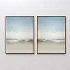 The Faded Silence Set of 2 features framed abstract wall art in soft, blurred blue and beige tones, hanging side by side to create a calm, minimalist vibe—perfect for modern decor.