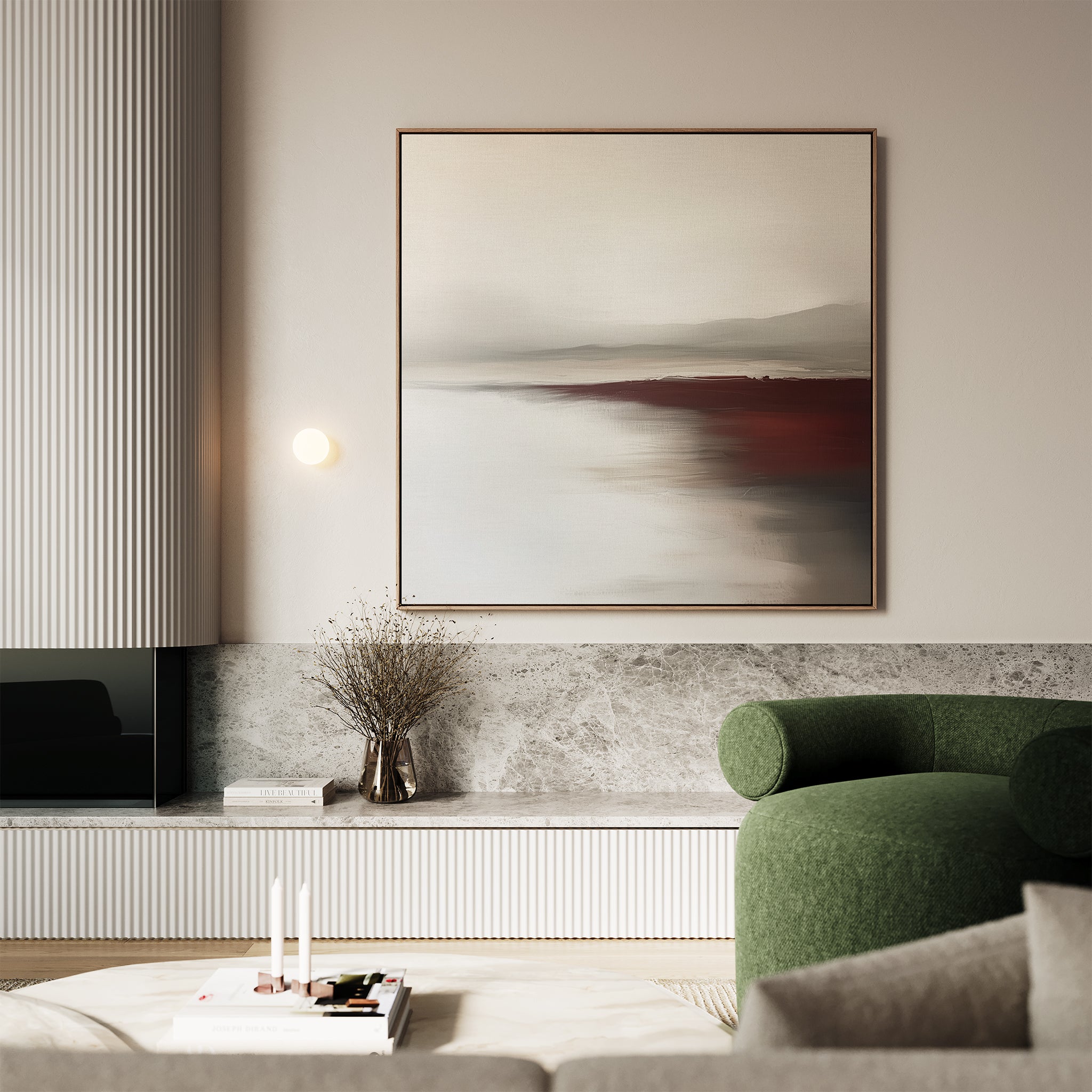 A modern living room with a green armchair, marble-top console, dried branches in a vase, and the Fading Light Canvas Art—minimalist abstract landscape wall art in neutral and red tones—creates a softly lit, minimalistic decor.