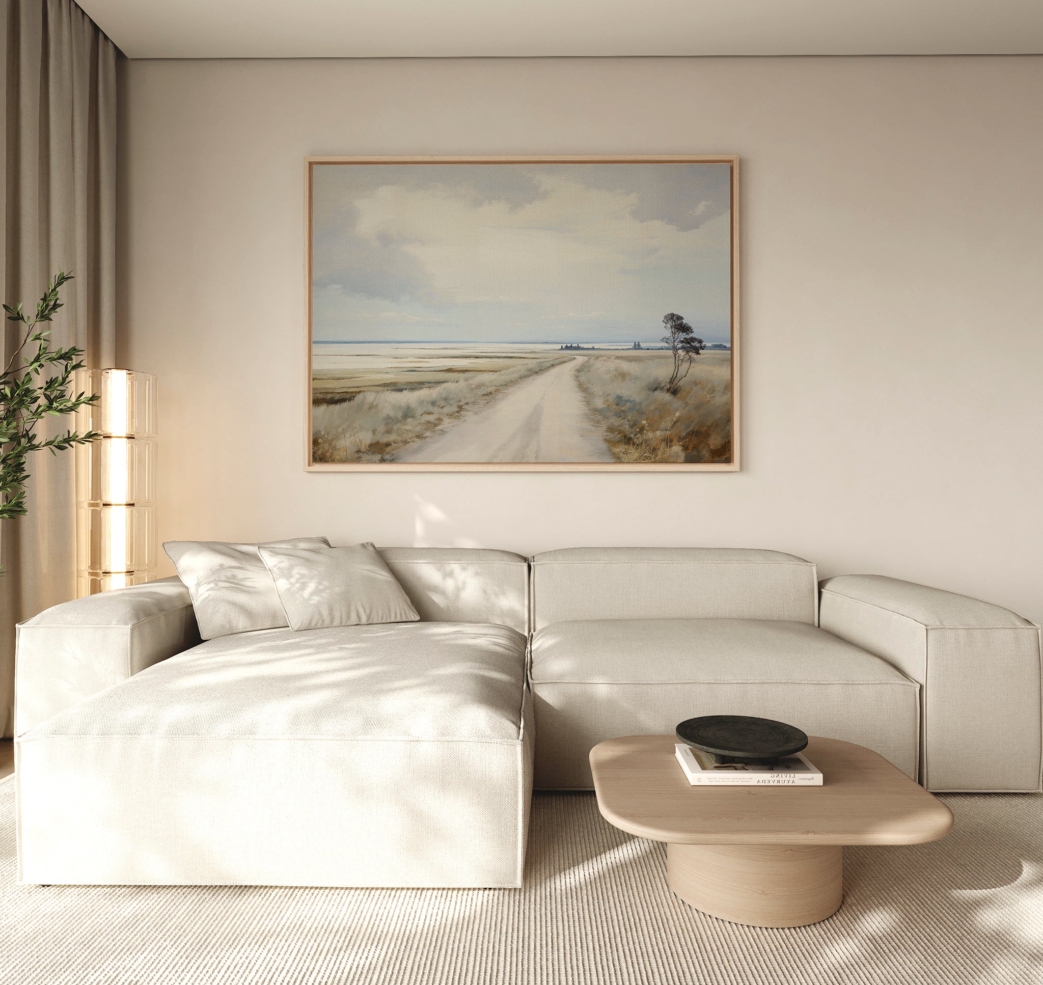 A modern living room featuring a light beige sectional sofa, minimalist decor, a wooden coffee table with a black bowl, a potted plant, and the Far Light Canvas Art displayed above the sofa.