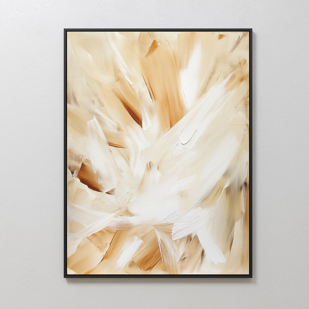 The Feathered Touch Abstract Canvas Art features broad brushstrokes in warm beige, tan, and white tones. This elegant piece includes a thin black border and adds a light, airy feel to any room when hung on a plain white wall.