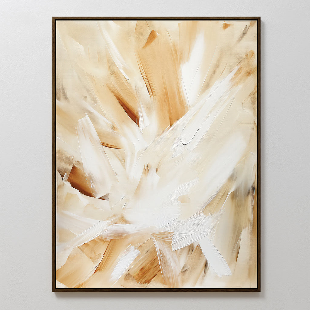 Feathered Touch Abstract Canvas Art features sweeping brushstrokes in beige, tan, and white. This framed wall art print creates a dynamic look against a white wall—perfect for adding elegant style to your home decor.