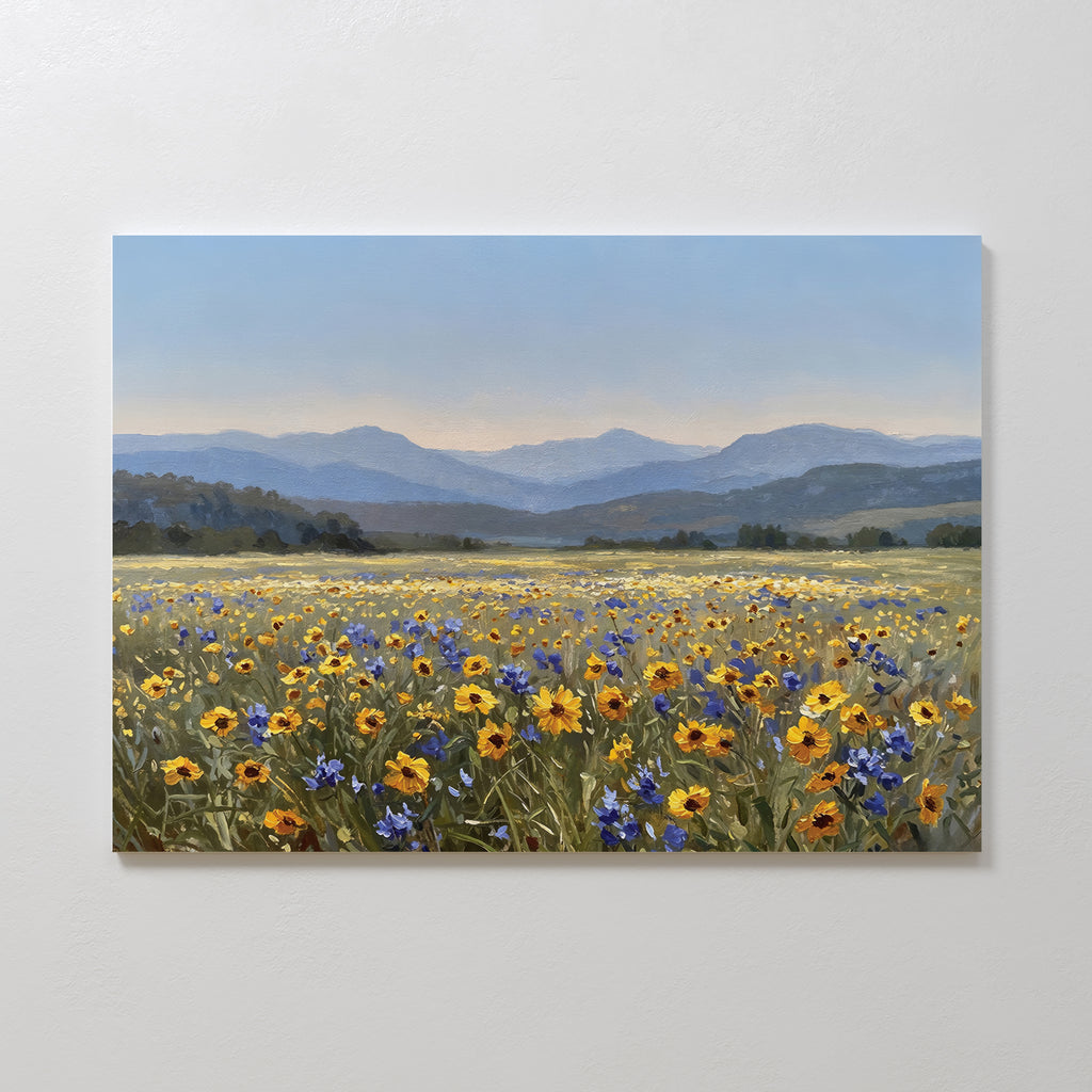 Bring your space to life with the Fields of Color Canvas Art, featuring vibrant yellow and blue wildflowers stretching toward distant hills beneath a clear sky. This wall art print is ideal for modern home decor and looks stunning on crisp white walls.