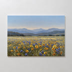 Bring your space to life with the Fields of Color Canvas Art, featuring vibrant yellow and blue wildflowers stretching toward distant hills beneath a clear sky. This wall art print is ideal for modern home decor and looks stunning on crisp white walls.