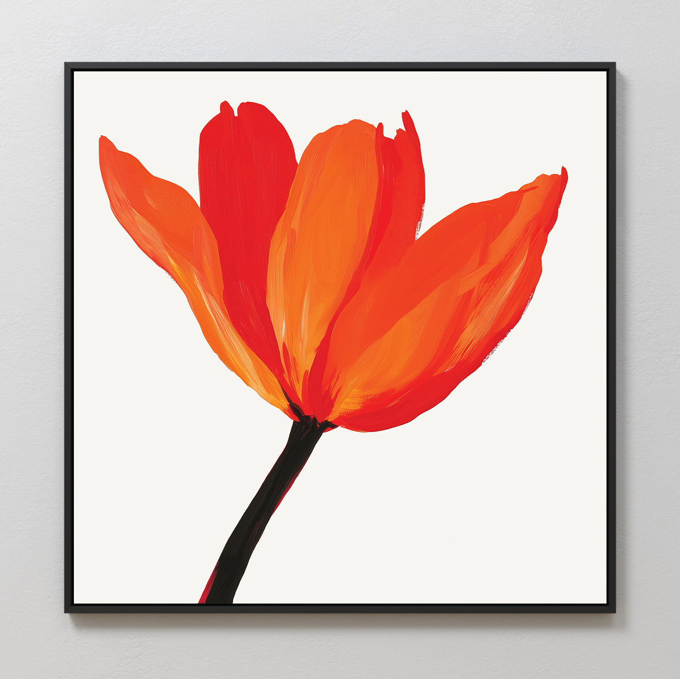 Flame Tulip Canvas Art features a minimalist floral print of an orange-red three-petal flower with a dark stem on white, framed in thin black—ideal wall art for modern living room decor.