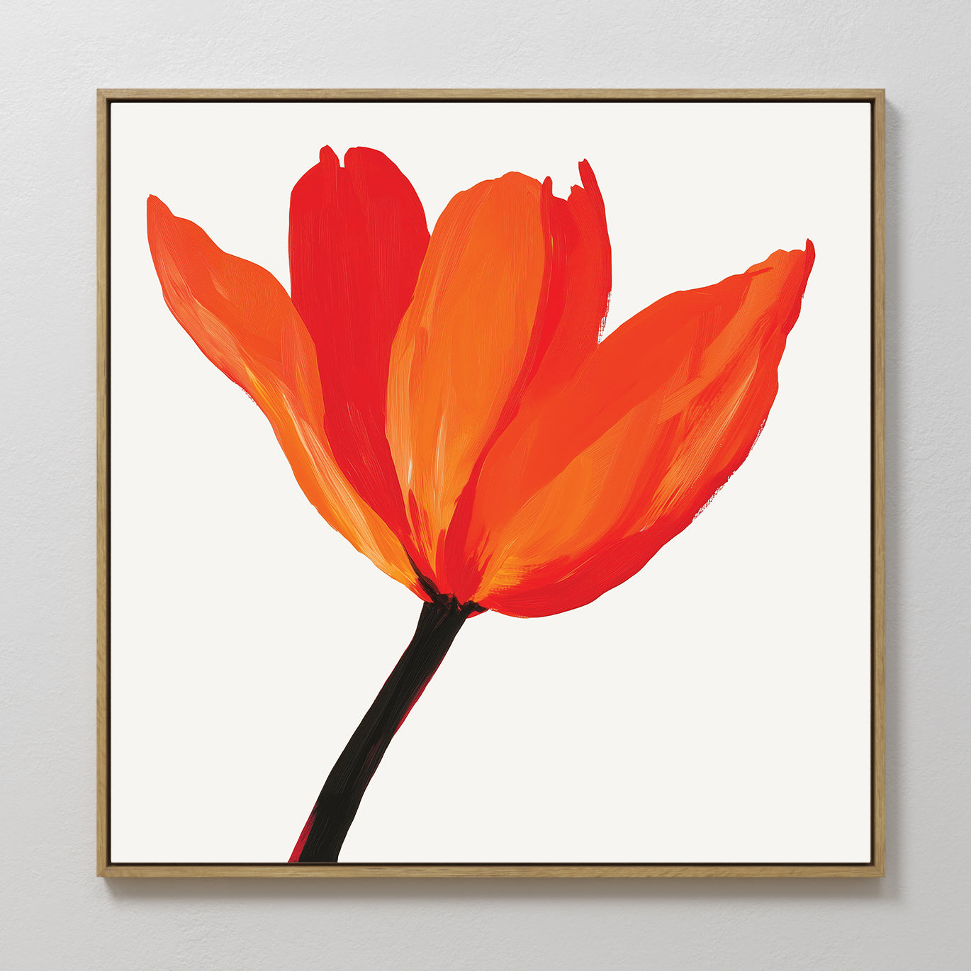 The Flame Tulip Canvas Art features a framed painting of a red and orange tulip with three bold petals and a dark stem on a white background, making it a perfect minimalist floral print for living room decor.