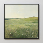 Floral Meadow Canvas Art features a sunlit grassy meadow with wildflowers, rolling hills, and a soft sky—an ideal wall decor piece for your living room.