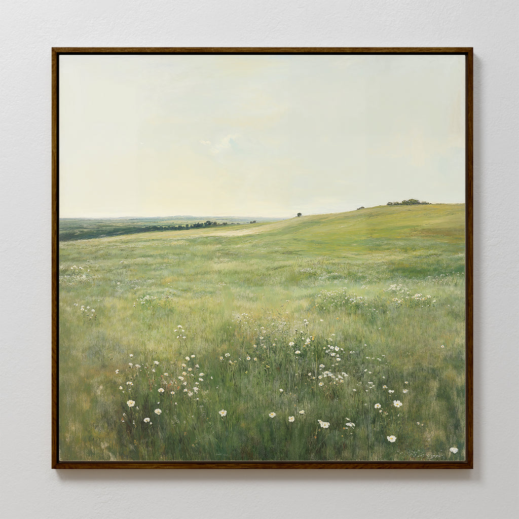 The Floral Meadow Canvas Art features a sunlit grassy field with white wildflowers, gentle hills, and a serene atmosphere—an ideal framed wall art print for enhancing your living room decor.