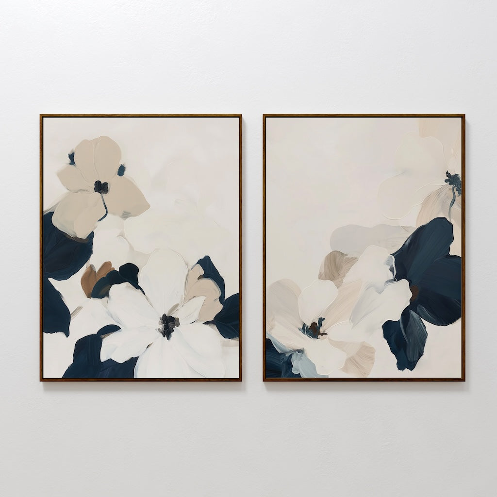 The Floral Serenity Set of 2 features framed abstract floral art with large white petals, dark blue, beige, and tan accents on a light background—ideal minimalist wall decor for your living room.