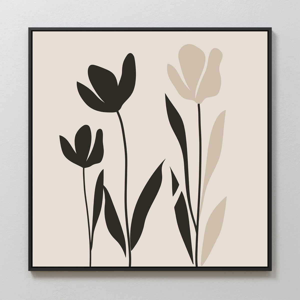 Floral Simplicity Canvas Art showcases three abstract flowers with solid black and beige shapes for petals and leaves, set on a light background and framed in a thin black frame—ideal for vintage-inspired decor.