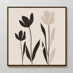 Floral Simplicity Canvas Art showcases three tulip-style flowers with long leaves in black and beige silhouettes on a light background, framed by a slim dark wood border—ideal for vintage-inspired decor.
