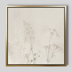 Floral Symphony Abstract Canvas Art showcases delicate, neutral-toned botanical silhouettes of wildflowers and grasses on a light beige background with a sleek gold and black frame—perfect for elevating your living room decor.