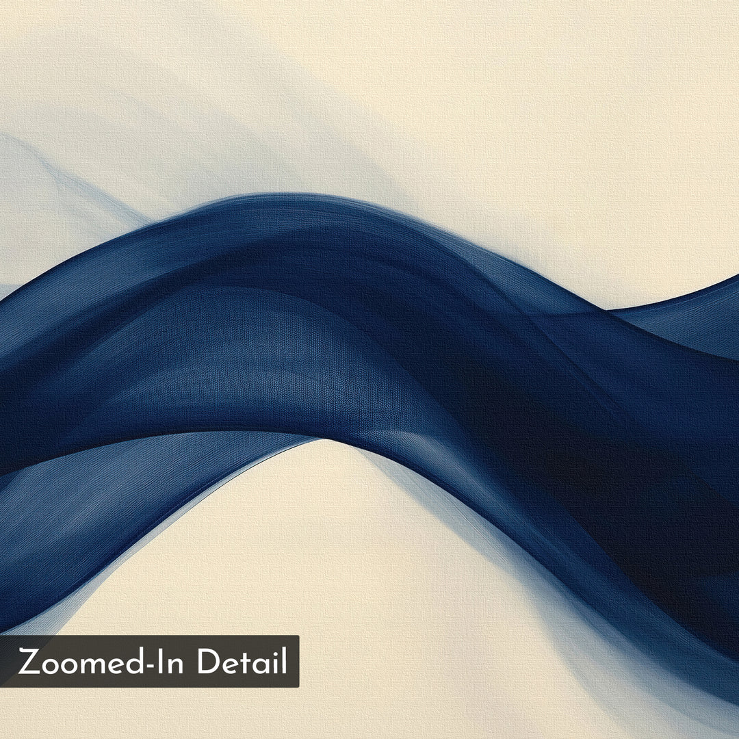 A close-up of the Flowing Indigo Set of 2 shows a translucent navy wave shape on beige, capturing smooth textures and fluid motion. Modern wall art ideal for minimalist interiors. A label reads "Zoomed-In Detail.