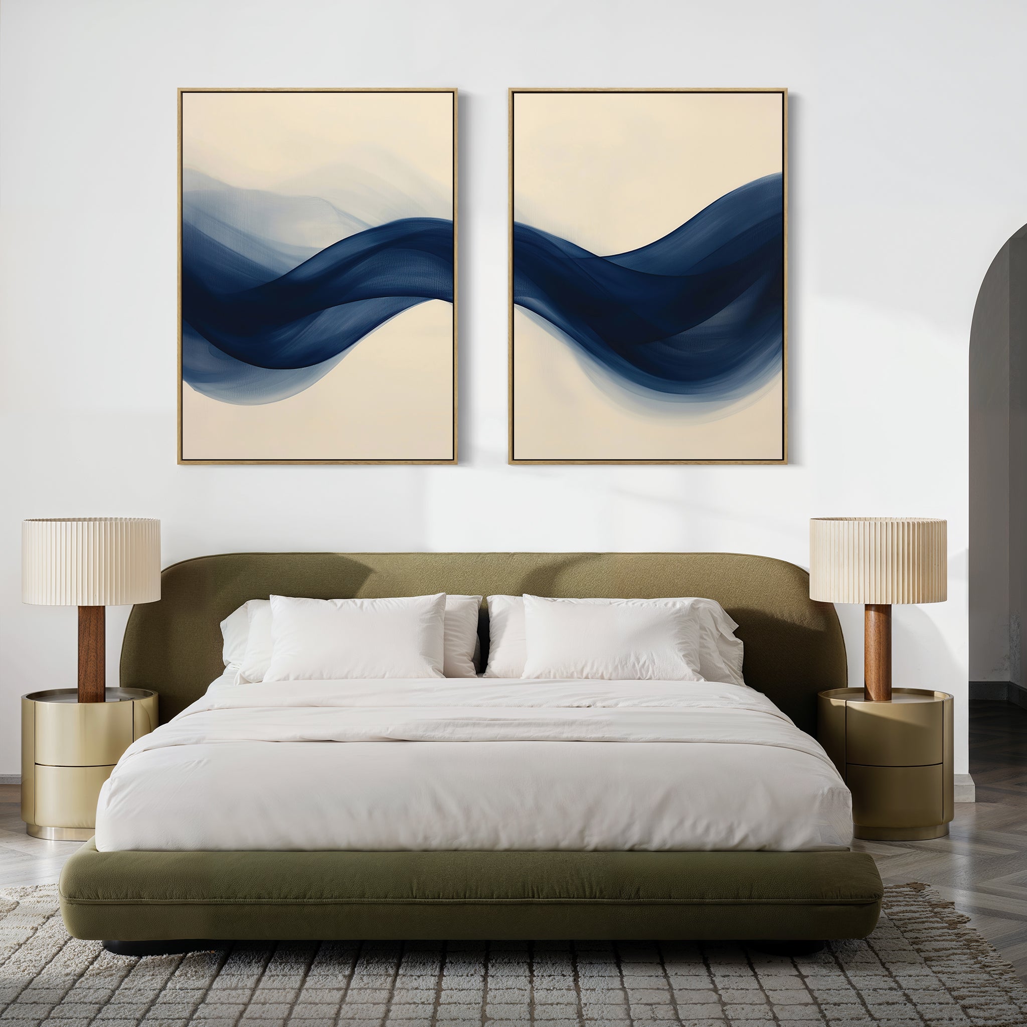 The Flowing Indigo Set of 2 wall art, paired with a white bed and two lamps, creates a serene ambiance ideal for minimalist interiors.