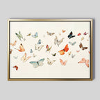 Fluttering Dreams Abstract Canvas Art features vibrant butterflies in orange, blue, yellow, and brown on a light, neutral backdrop—ideal minimalist wall decor for any room.