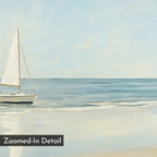 Freedoms Call Canvas Art shows a sailboat with white sails gliding on calm blue water near a sandy shore beneath a pale sky. Its soft, minimalist style makes it ideal sea-themed decor. Text in the bottom left corner reads Zoomed-In Detail.