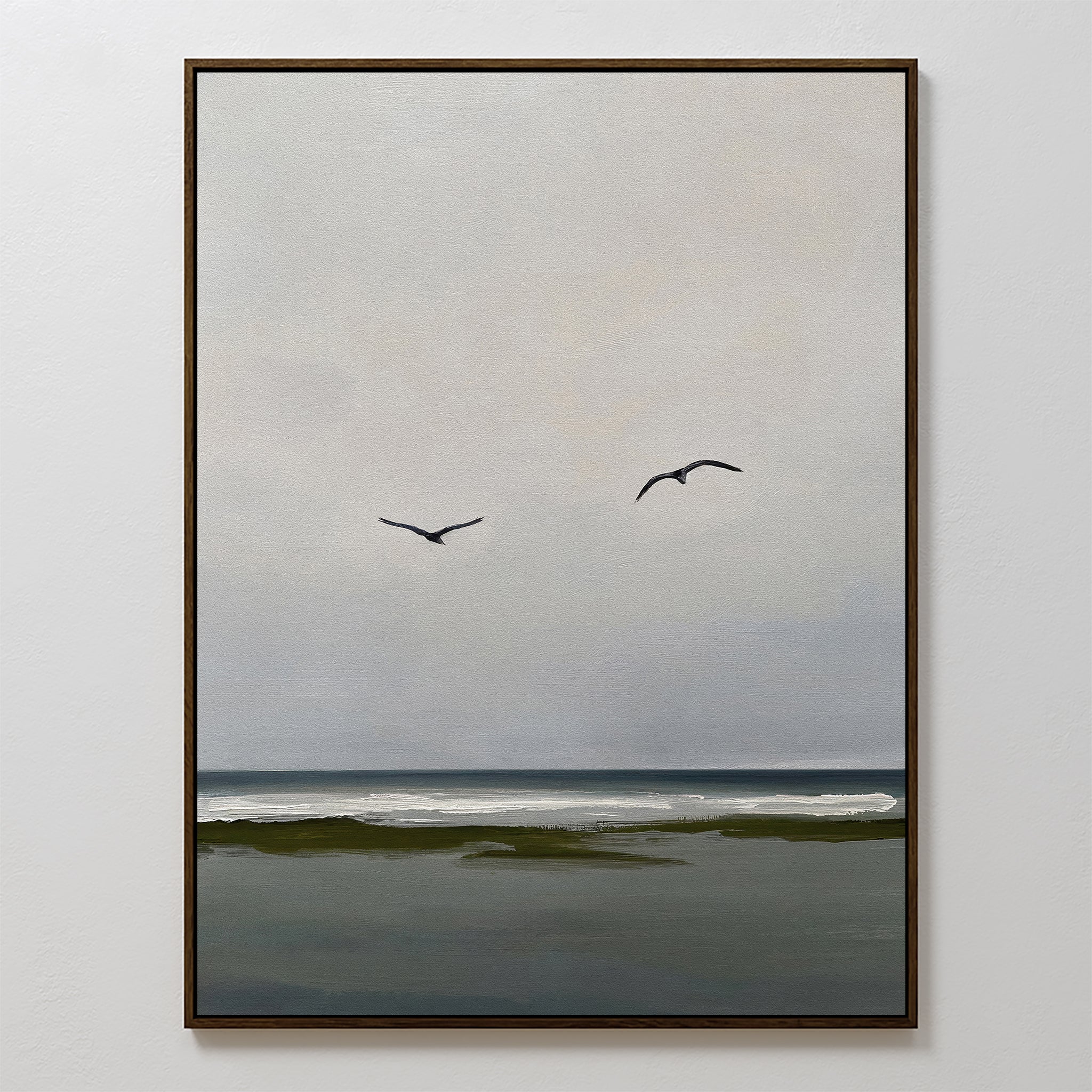 Freeflight Canvas Art features a minimalist seascape with two birds gliding above gentle waves and a dark shoreline under a gray sky—perfect for serene, uncluttered wall decor in any room.