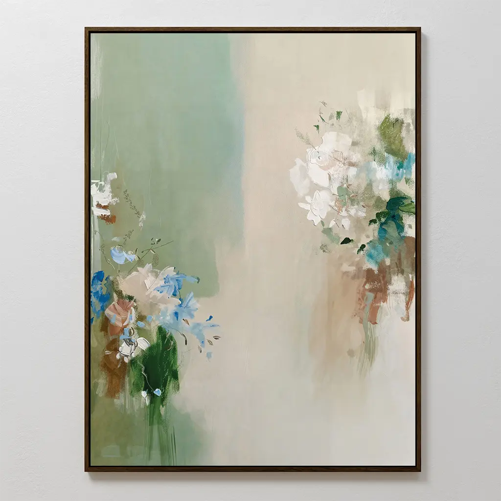 Elegant decor comes to life with the Garden Bloom Canvas Art, featuring soft, abstract florals in white, blue, and brown on a beige-green canvas, beautifully framed and displayed against a white wall.