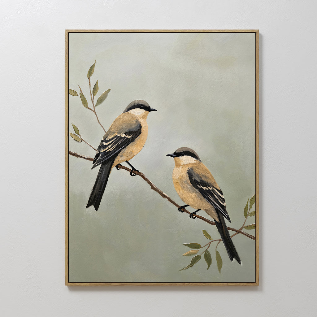 The Garden Pair Canvas Art features two brown and black birds on a leafy branch with a light green background—an ideal way to bring Nordic Park charm to your living room decor.