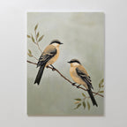 Garden Pair Canvas Art features two tan and brown birds with black markings perched on a leafy branch, set against a soft green background. Ideal as living room decor, it brings serene Nordic Park beauty to your space.