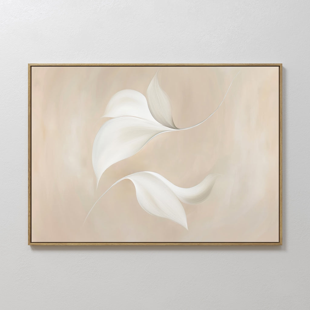 Elevate your space with Garden Spectrum Abstract Canvas Art—three white, abstract leaves on a beige background in a slim gold frame, bringing elegant minimalist style to your bedroom or living room decor.