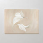 Garden Spectrum Abstract Canvas Art features three soft, abstract white leaves with gentle curves on a smooth beige background. This minimalist wall art adds a calm, airy touch to bedroom or living room decor.