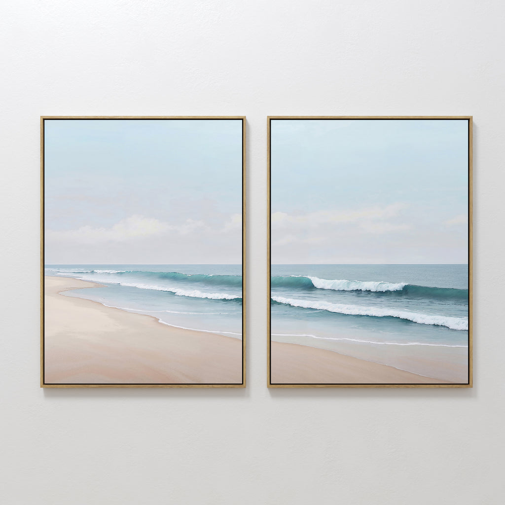 The Gentle Surf Set of 2 features framed beach scenes with gentle waves and soft sand, creating perfect coastal wall art that brings peaceful, seaside charm to any living room decor.